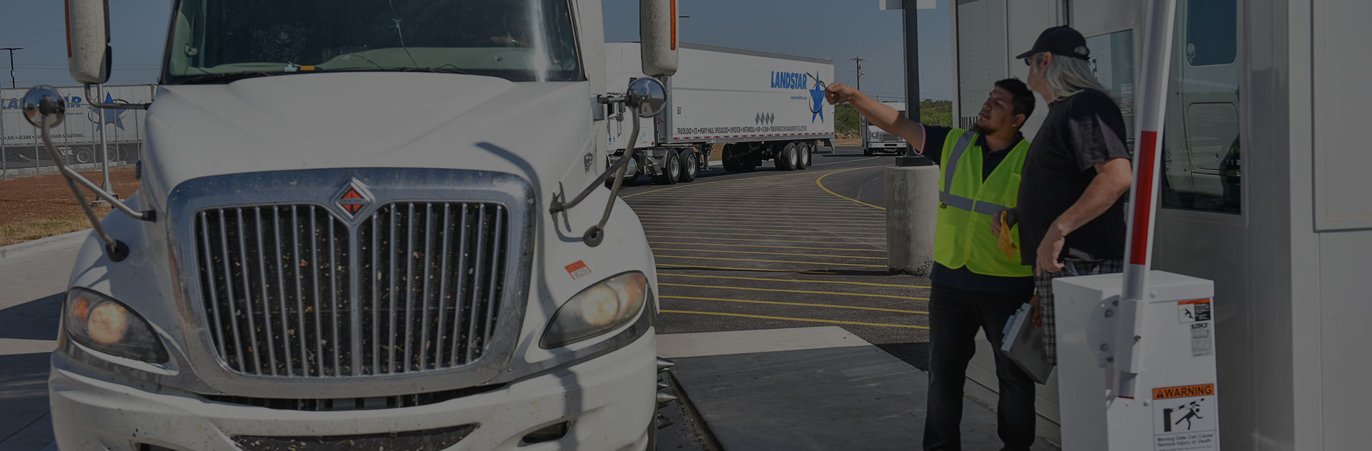 Image of a truck at a boarder checkpoint